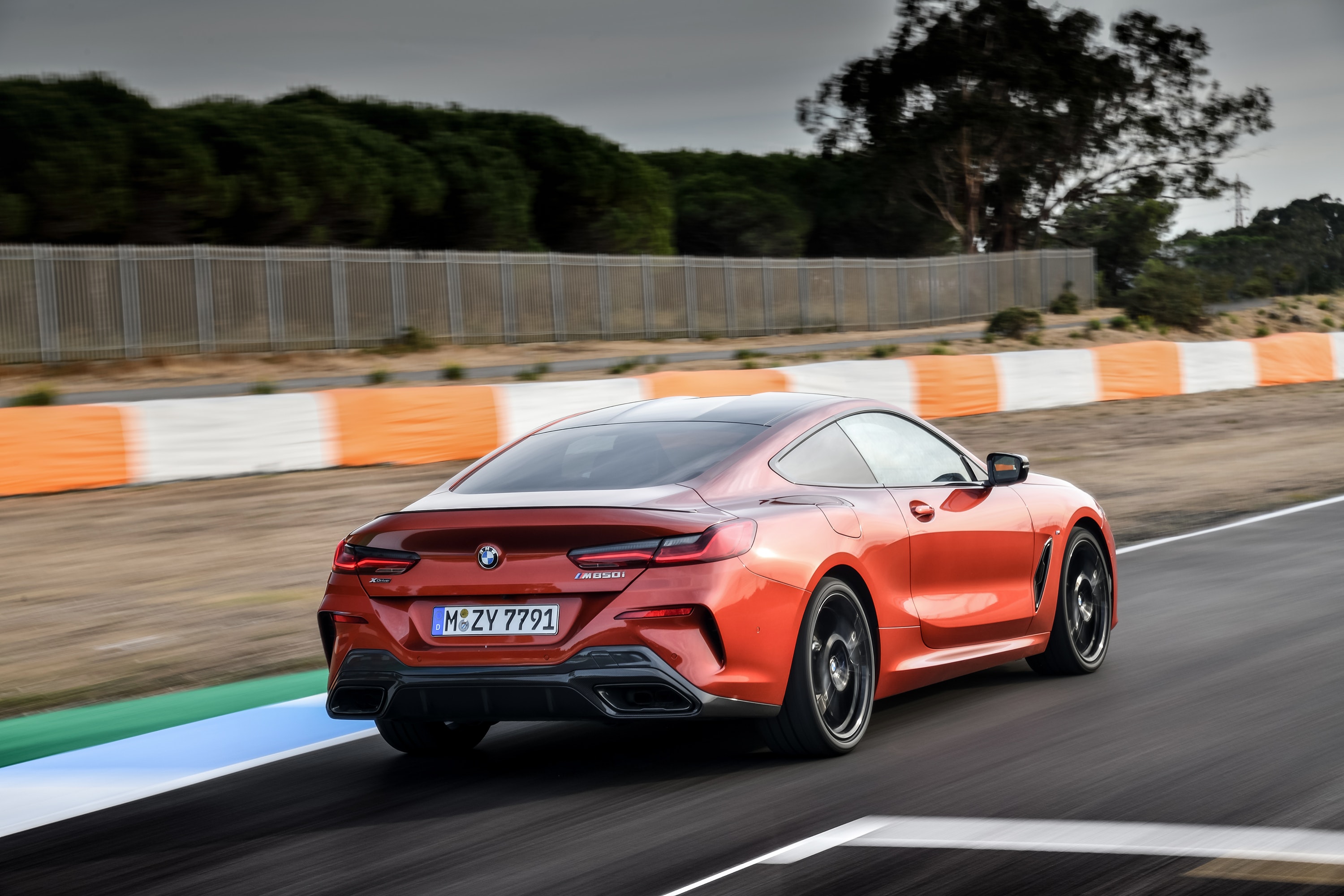 Rear view of orange BMW 8 Series